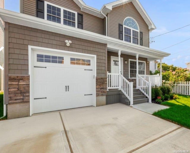 view of front of property with a garage