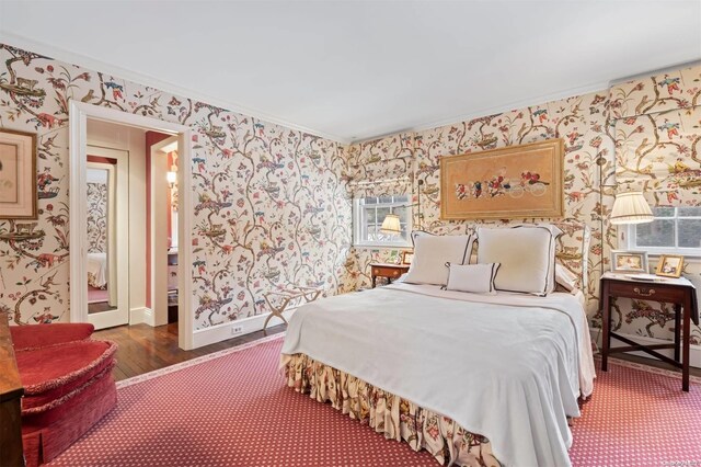 285 Piping Rock Rd, Locust Valley, NY 11560 - bedroom with wallpapered walls, crown molding, carpet flooring, and wood finished floors