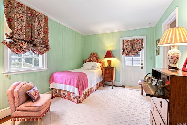 bedroom with multiple windows and crown molding