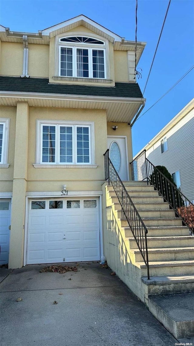 view of front of house with a garage