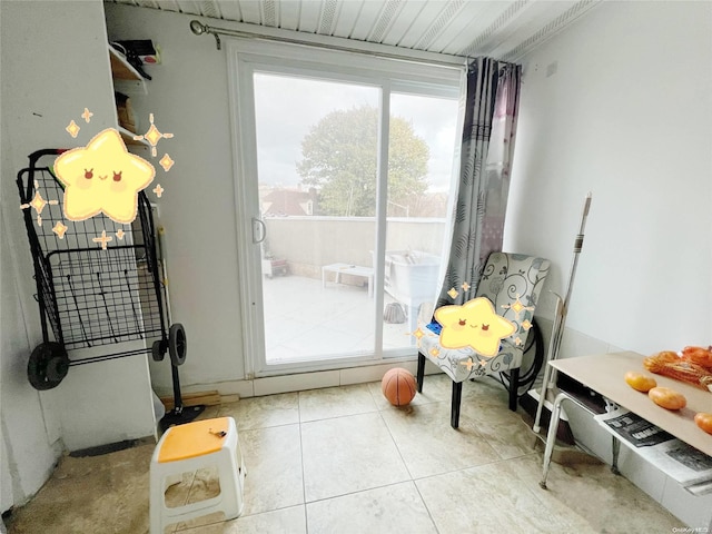 doorway featuring light tile patterned floors