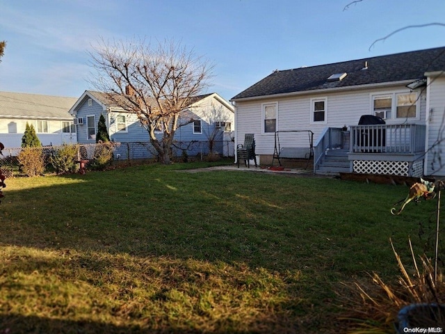 view of yard with a deck