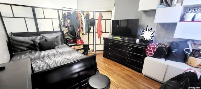 607 Ashford St, Brooklyn, NY 11207 - bedroom featuring light wood finished floors