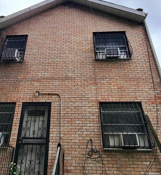 607 Ashford St, Brooklyn, NY 11207 - view of building exterior with cooling unit