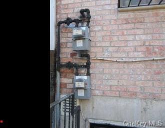 607 Ashford St, Brooklyn, NY 11207 - utility room with gas meter