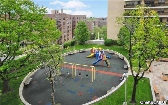 view of home's community featuring a playground