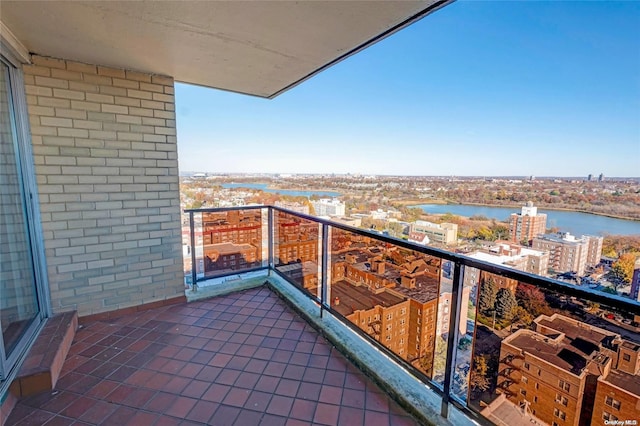 balcony featuring a water view