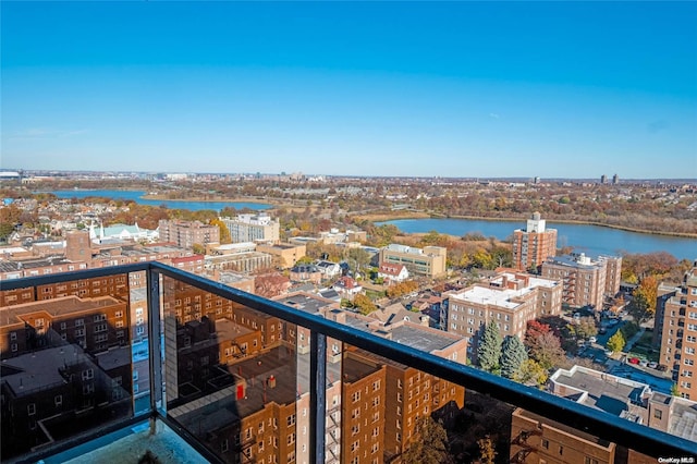 balcony featuring a water view