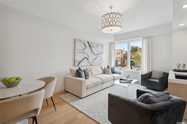 living room with light hardwood / wood-style flooring