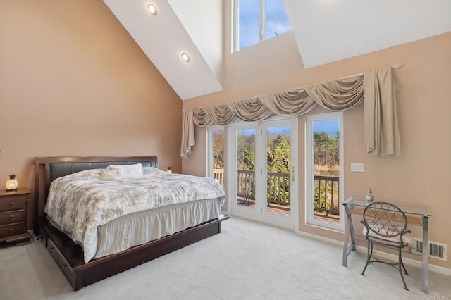 bedroom featuring high vaulted ceiling, access to outside, multiple windows, and light carpet