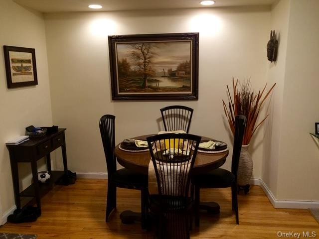 dining room with light hardwood / wood-style floors