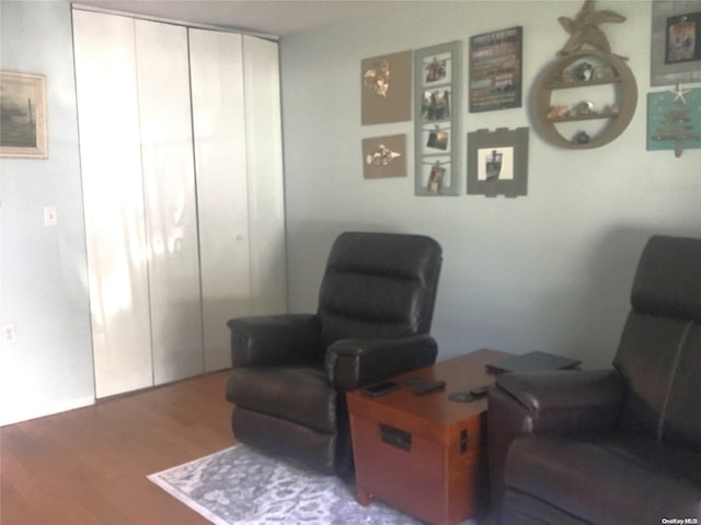 living area featuring hardwood / wood-style floors