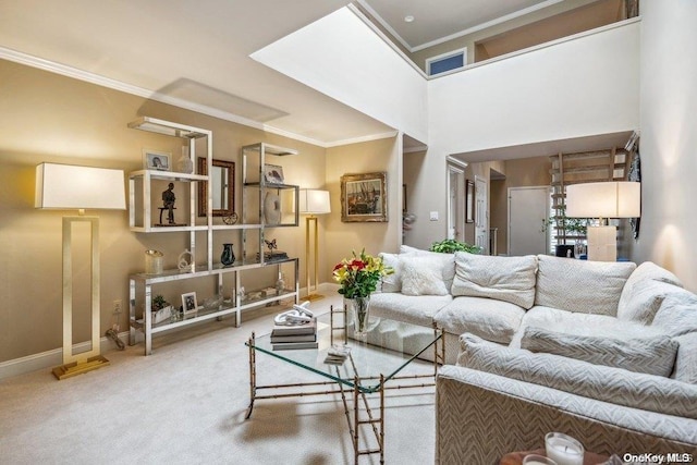 living room featuring carpet, a high ceiling, and crown molding