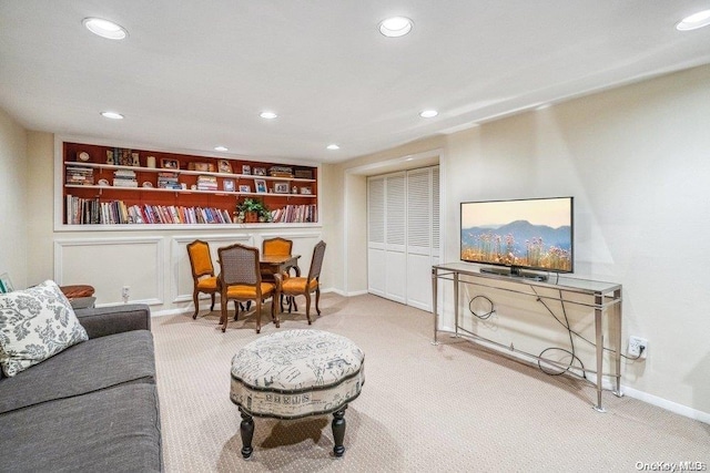 living room featuring light colored carpet