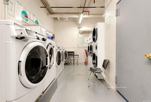 washroom with washing machine and dryer and stacked washer and dryer