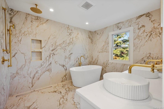 bathroom featuring tile walls and independent shower and bath