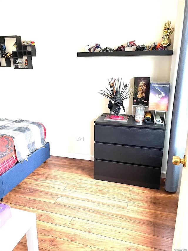 bedroom featuring hardwood / wood-style floors