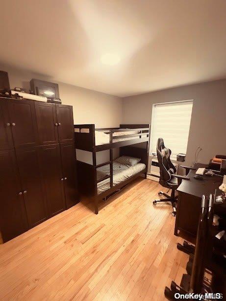 bedroom featuring light hardwood / wood-style floors