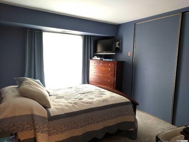 bedroom featuring carpet flooring