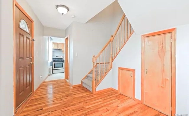 entryway with light wood-type flooring