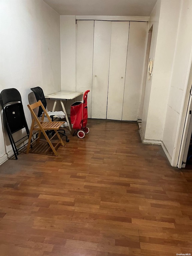 dining space with dark wood-type flooring