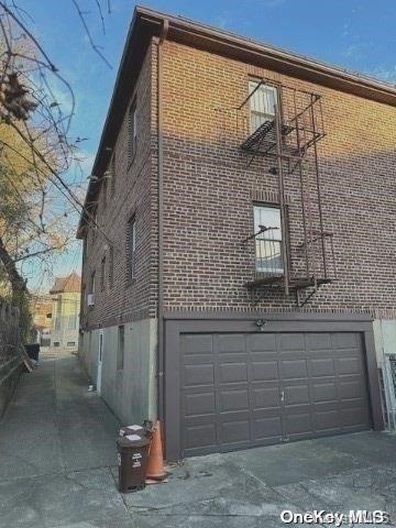 view of property exterior with a garage