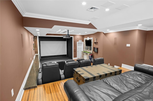 cinema featuring crown molding and vaulted ceiling