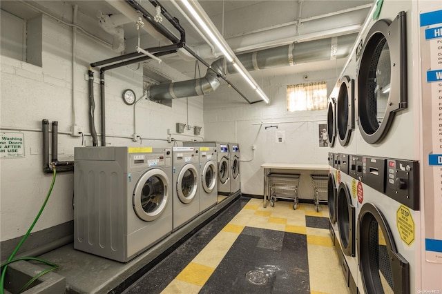 washroom featuring washer and clothes dryer