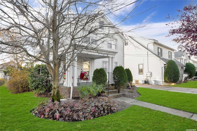 view of front of property with a front lawn