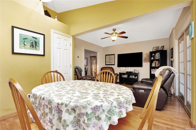 dining room featuring light hardwood / wood-style floors, plenty of natural light, and ceiling fan