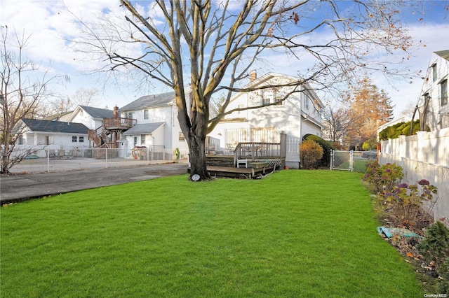 view of yard with a deck