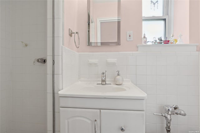 bathroom with vanity and walk in shower