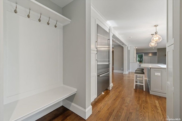 mudroom with hardwood / wood-style floors