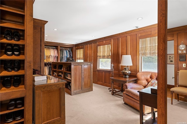 carpeted office with wooden walls