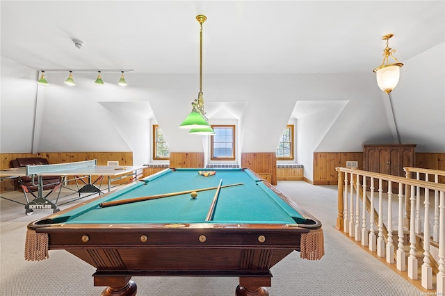 recreation room featuring vaulted ceiling, billiards, a healthy amount of sunlight, and wood walls