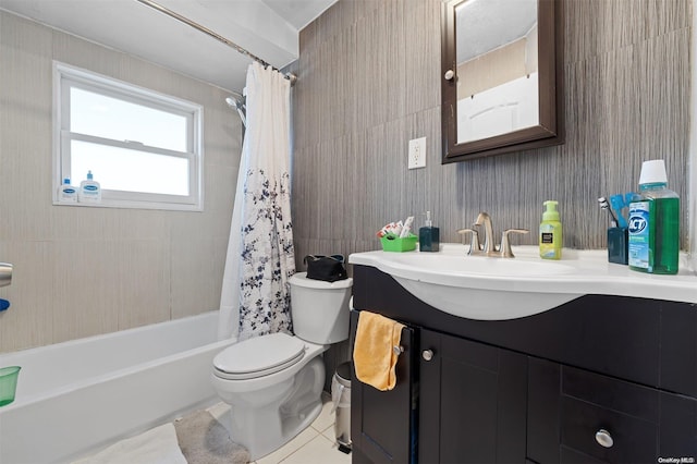 full bathroom with tile patterned floors, vanity, shower / tub combo, and toilet