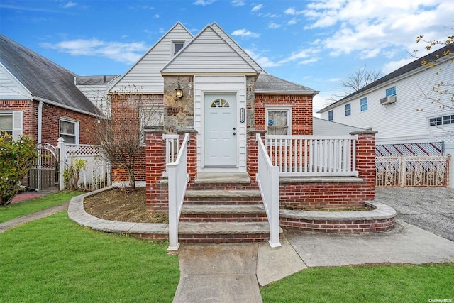 view of front of home with a front yard