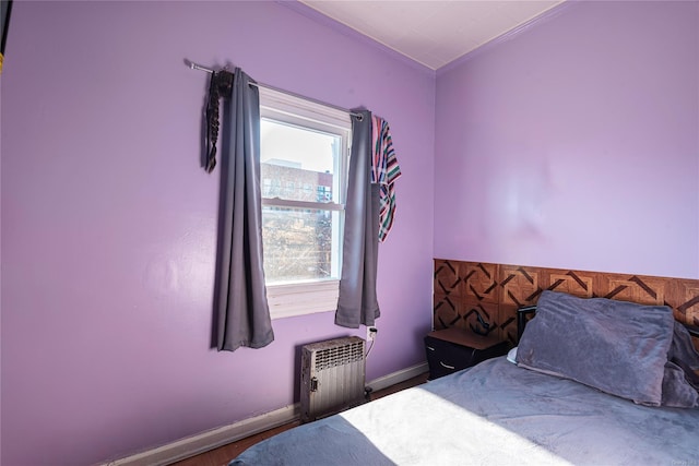 bedroom featuring radiator heating unit