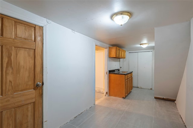 kitchen with light tile patterned floors