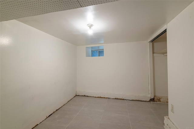 basement with light tile patterned floors