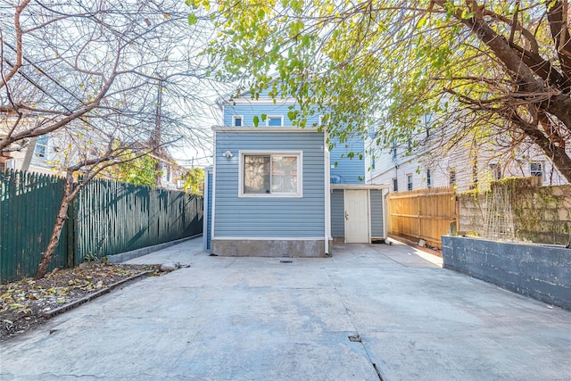 94-67 44th Ave, Elmhurst, NY 11373 - fenced backyard featuring a patio area