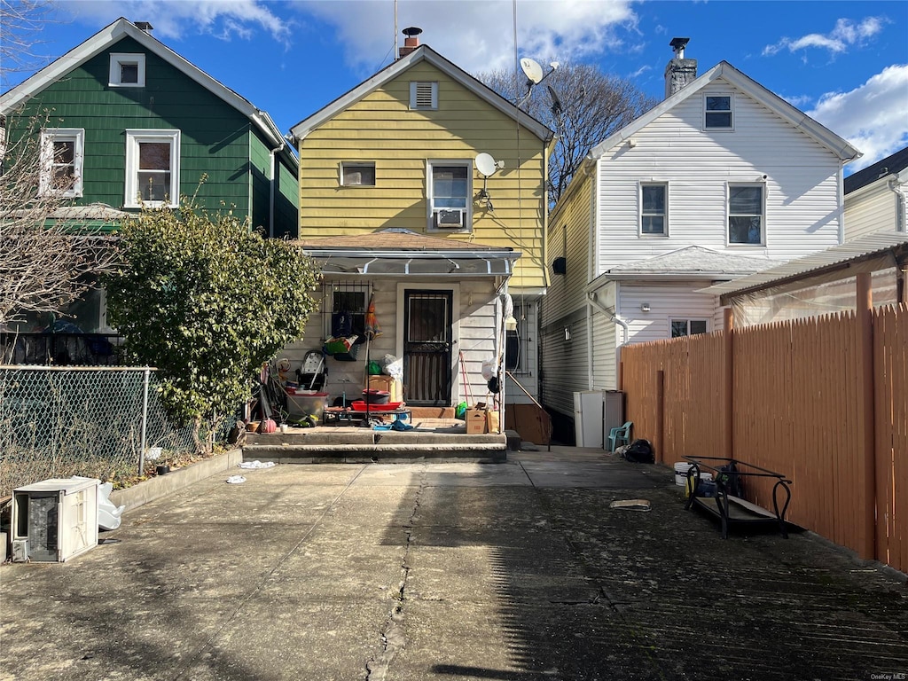 view of front of house with a patio area