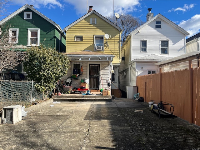 view of front of house with a patio area