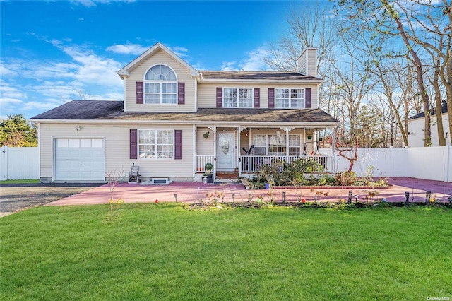 view of front of home with a porch, a garage, and a front lawn