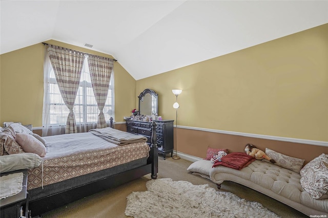 bedroom with light carpet and vaulted ceiling