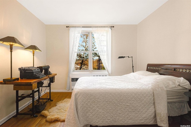 bedroom featuring hardwood / wood-style floors