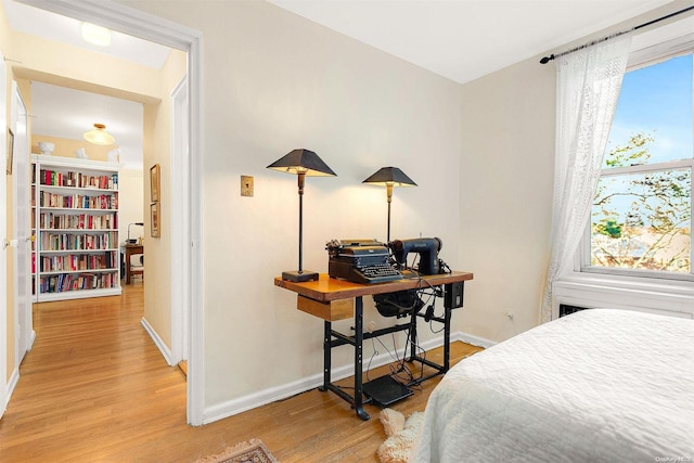 bedroom featuring light wood-type flooring