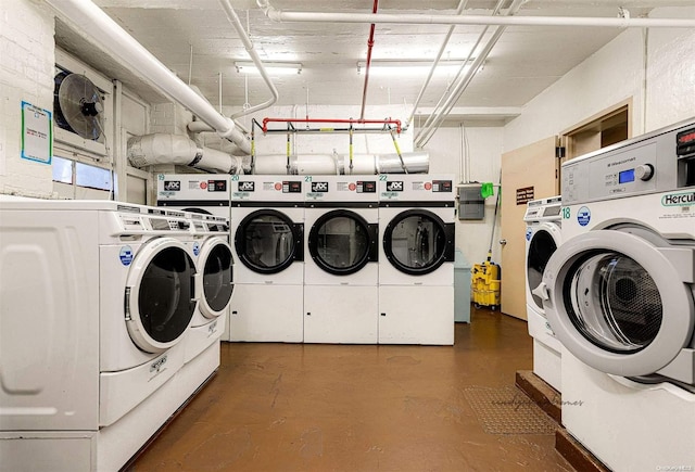 laundry area featuring washing machine and clothes dryer