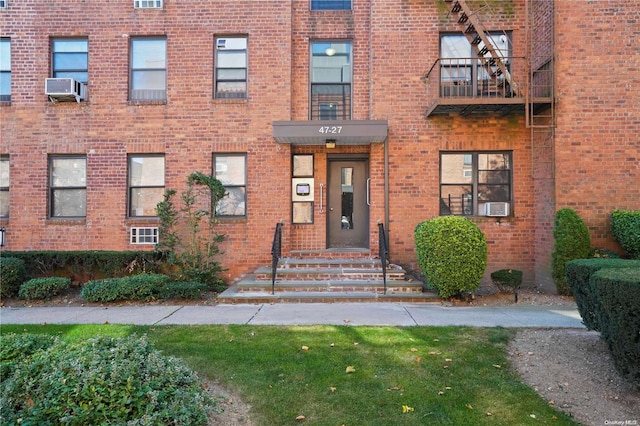 property entrance with cooling unit