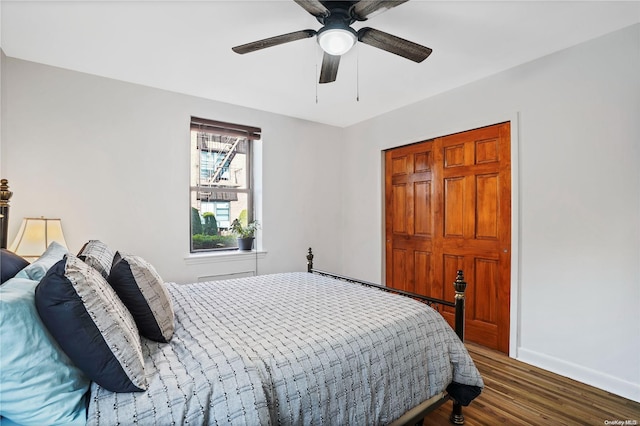 bedroom featuring dark hardwood / wood-style floors and ceiling fan